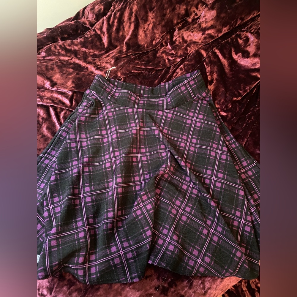 purple and black knee length skirt